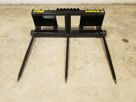 bale forks for skid steer|skid steer bale spear attachment.